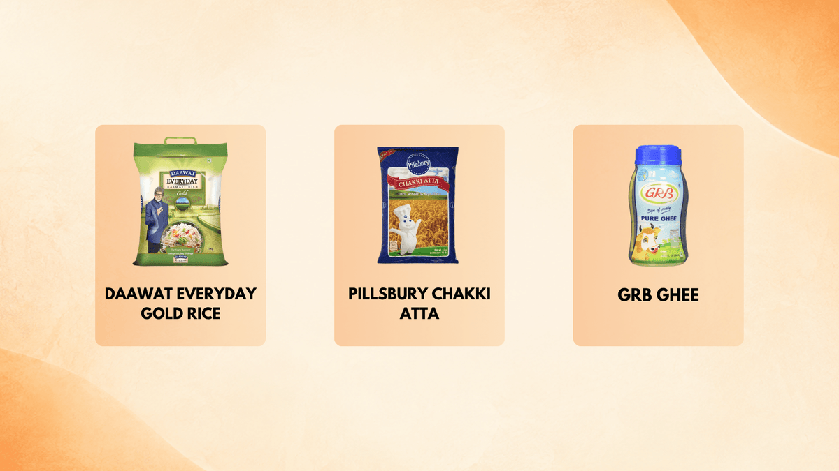 A promotional graphic showing three packaged food products on a warm beige background with soft orange abstract shapes. Left product: a green bag labeled Daawat Everyday Gold Rice.