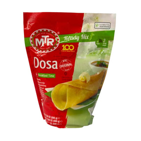 A package of M&R Dosa Ready Mix breakfast mix, featuring a red and green bag with an illustration of a dosha pancake on a white background.